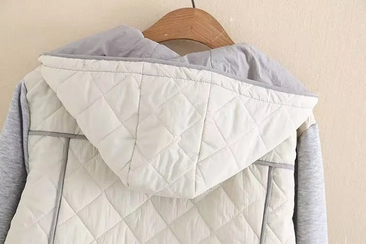 Stylish hooded winter coat for women, plus size fit, featuring a warm diamond quilted design.