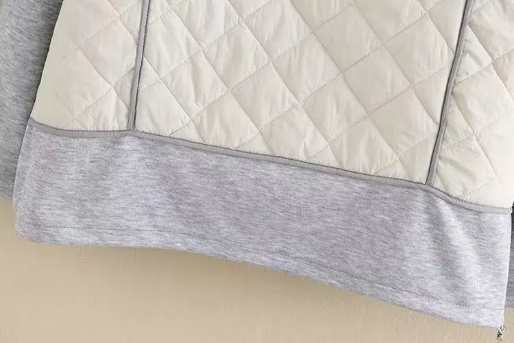 Casual plus size women's diamond quilted jacket with a hood, ideal for fall and winter outerwear.