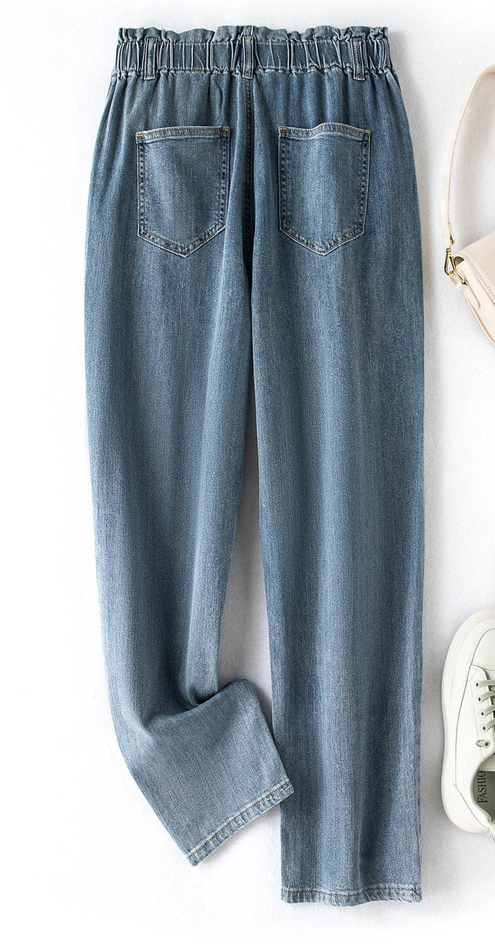 Versatile plus size high-waist mom jeans, stretch denim, great for any casual outfit.