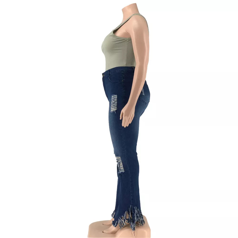Flattering plus size high-waist ripped flared jeans for women, comfortable and fashion-forward.