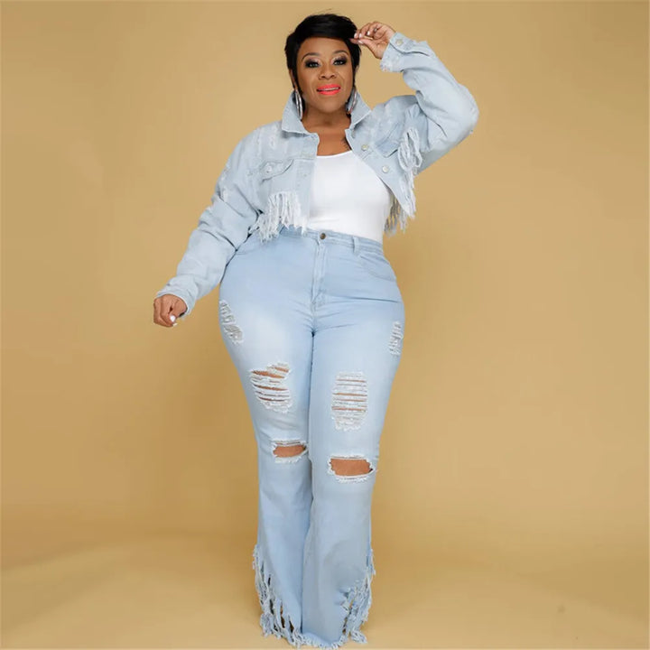 Casual plus size high-waist flared jeans with rips, perfect all-season stretch denim for women.