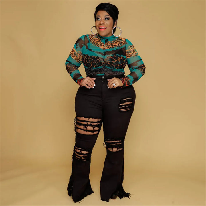 Women's plus size denim flared jeans, high-waisted and ripped for a trendy, comfortable fit.