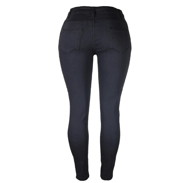 Modern women's plus size skinny jeans, high waist, comfortable stretch denim.