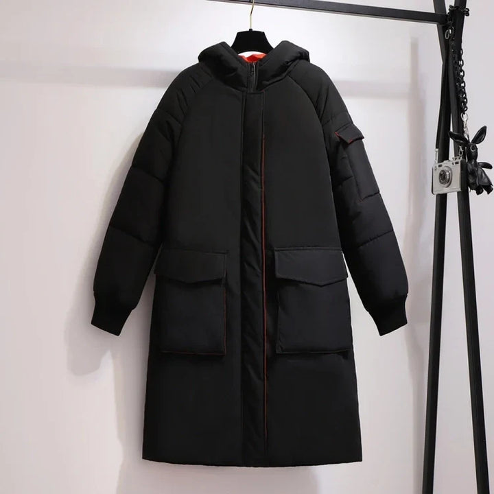Women's plus-size long padded winter jacket, oversized & hooded, for ultimate warmth and style.