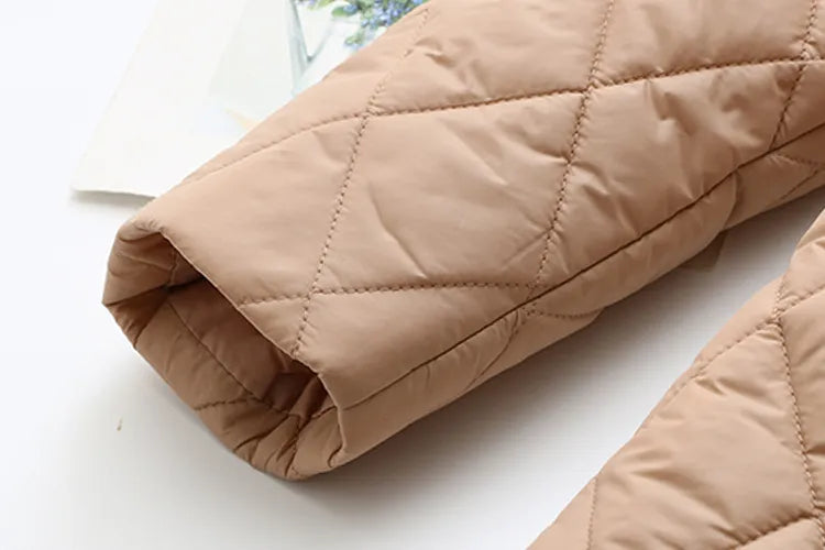 Women's plus size winter jacket, padded with a chic fall leaf print. Cozy & warm.