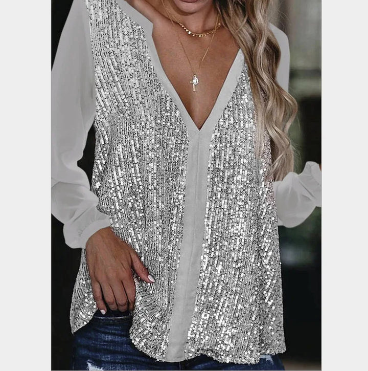 Glamorous women's plus size sequin V-neck blouse, perfect for special evening gatherings.