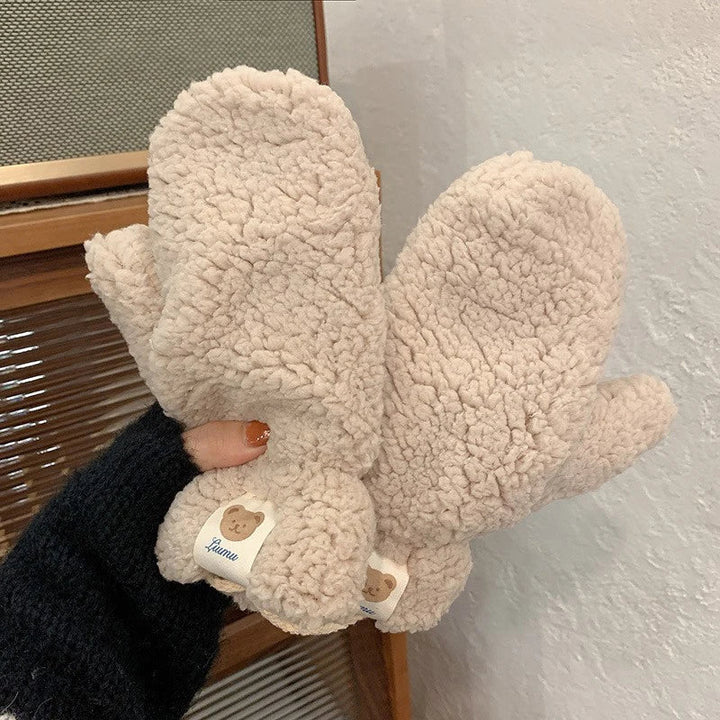 Women's plush teddy mittens in a soft, cozy fabric for ultimate winter warmth and comfort.