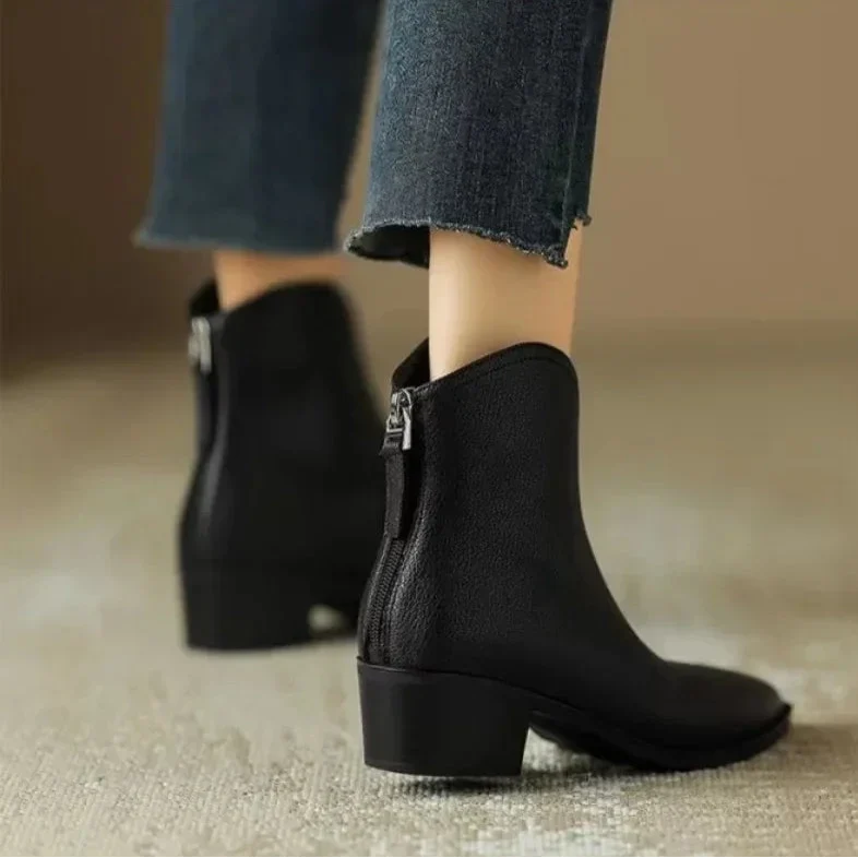 Stylish fall/winter ankle boots for women, pointed toe, low heel, easy slip-on. Great for everyday.