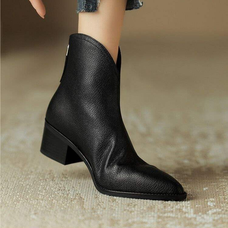 Versatile women's pointed toe ankle boots, slip-on, low heel. Ideal for office, casual, or chic looks.