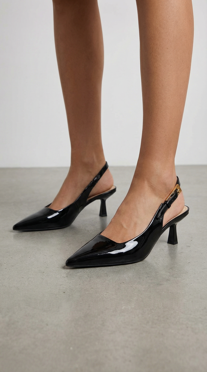 Comfortable women's pointed toe kitten heel slingback pumps; ideal chic footwear for work & parties.