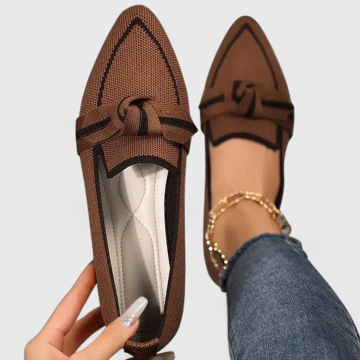 Chic women's pointed toe loafers. Versatile slip-on design with contrast trim, adding a modern touch to any outfit.