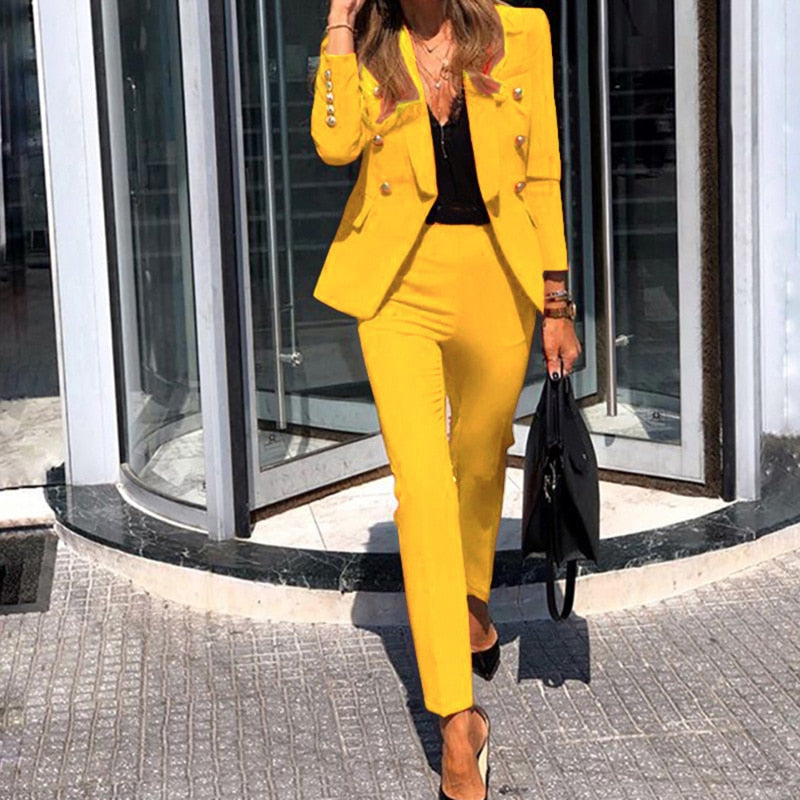 Women's polished double-breasted suit set with tailored blazer and pants, ideal for business and office wear.