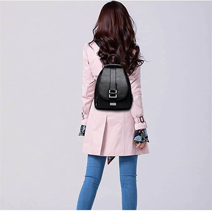 Elegant women's leather backpack, water-resistant and anti-theft for urban trips.