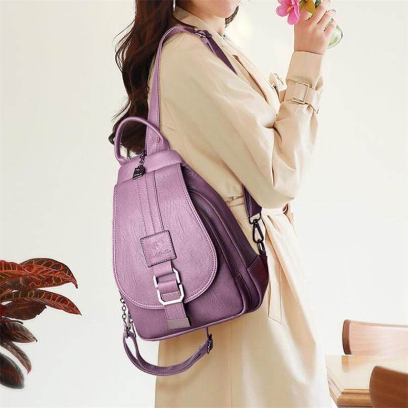 Secure water-resistant leather backpack for women, ideal for city commuting & travel.