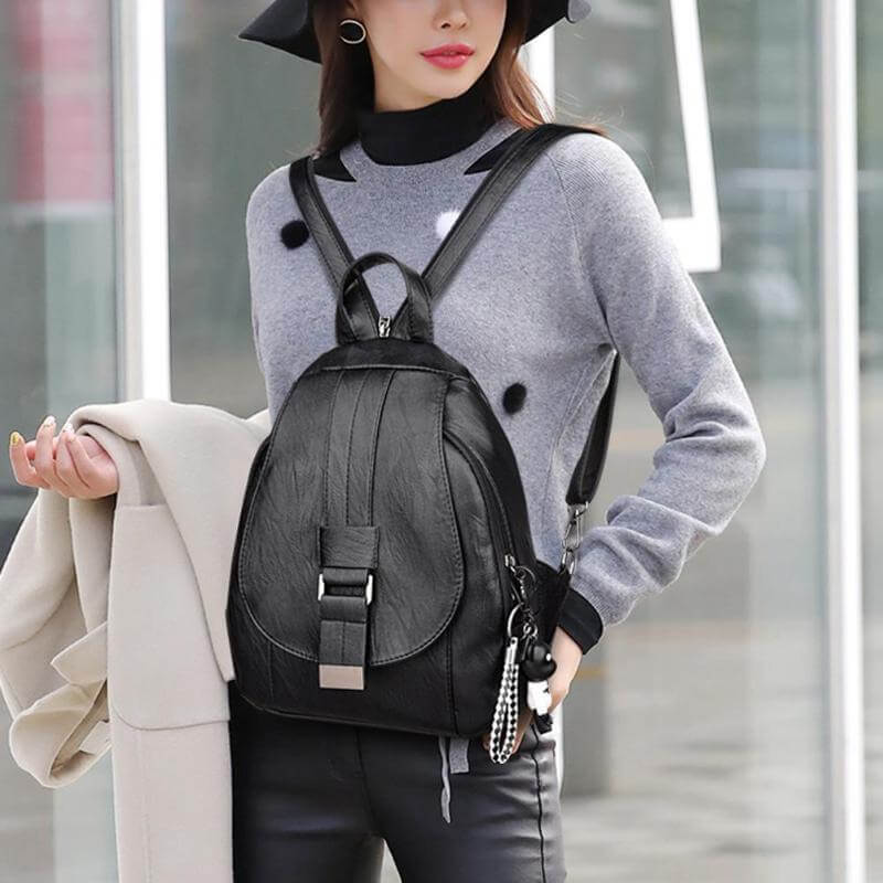 Premium anti-theft leather backpack for women, water-resistant and travel-ready.