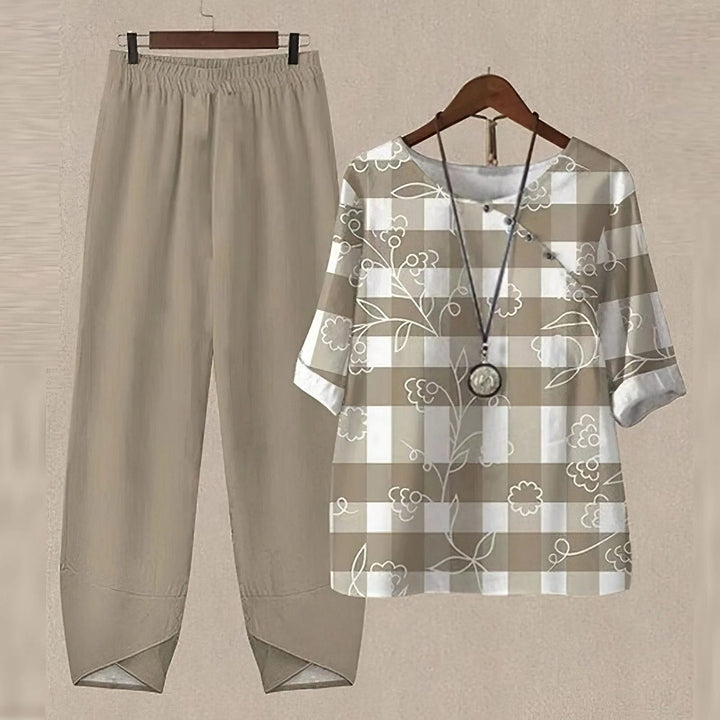 Versatile women's printed blouse and pants set, a stylish two-piece for casual or elegant summer wear.