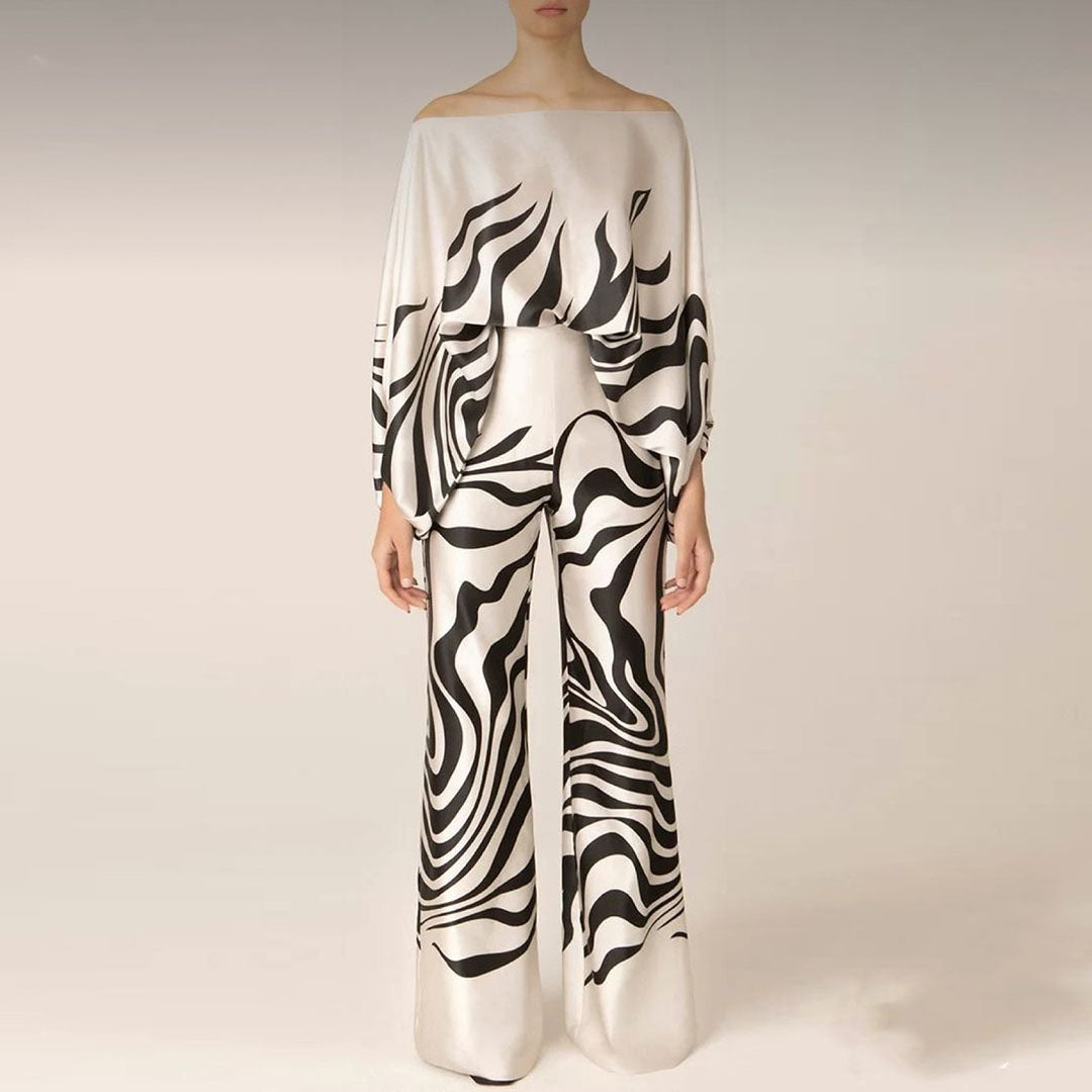 Close-up of a women's elegant one-shoulder printed top from a stylish matching co-ord set.