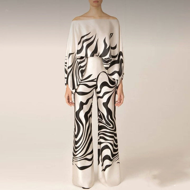 Close-up of a women's elegant one-shoulder printed top from a stylish matching co-ord set.