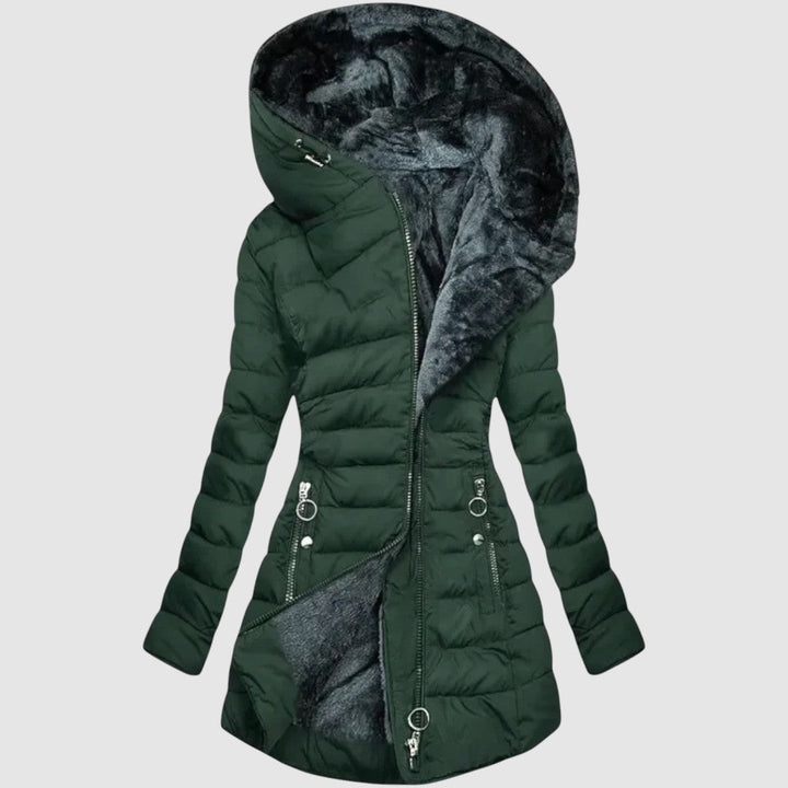 Warm women's quilted winter coat with a protective hood, designed for extreme cold weather. Cozy and functional outerwear.