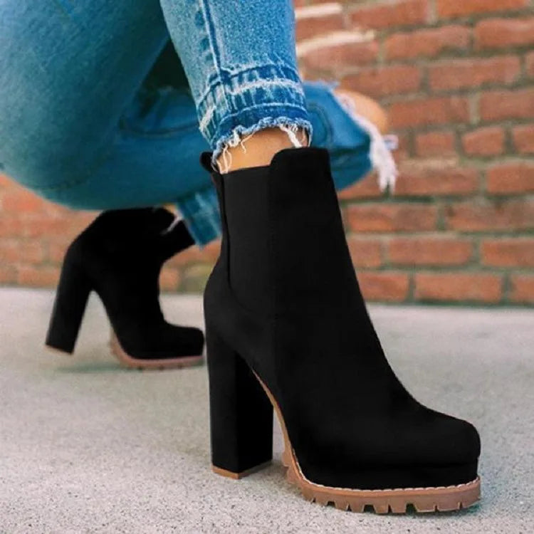 Women's Ravona Rise block heel boots; chic, comfortable, and stable dress boots for versatile fashion.