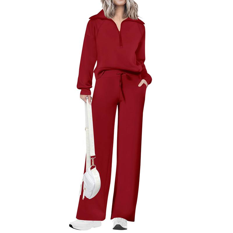Fashionable women's refined two-piece set. Half-zip top, wide-leg pants for chic, comfortable style.