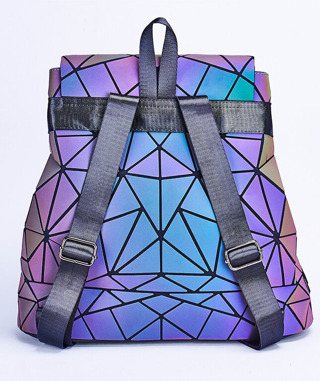 Luminous women's backpack with reflective geometric design for night safety & unique style.
