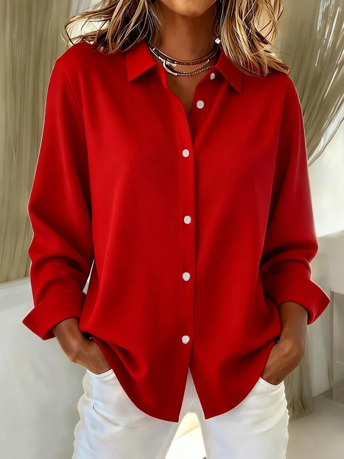 Oversized women's relaxed fit blouse with long sleeves, a fashionable and comfortable button-down shirt.