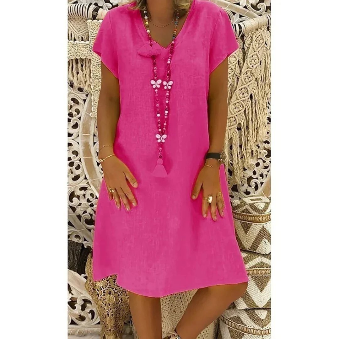 Versatile women's summer dress. Relaxed fit for casual warm weather comfort, suitable for everyday wear. Plus sizes.