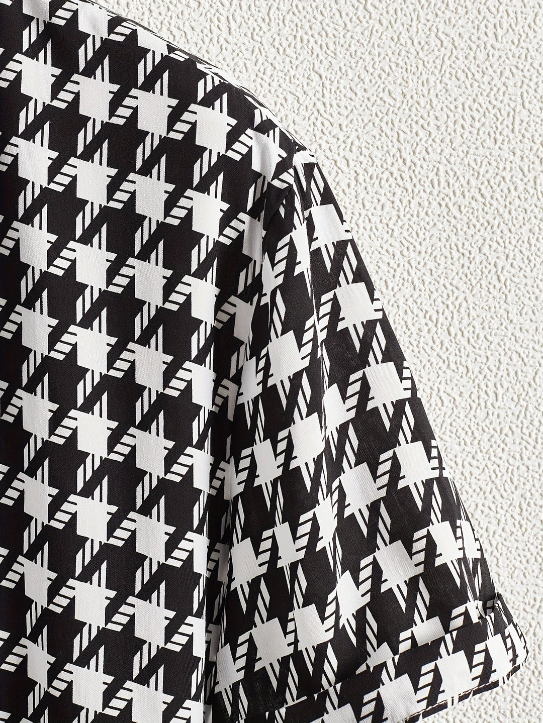 Women's houndstooth relaxed fit cotton blend button-up shirt, a perfect casual top.
