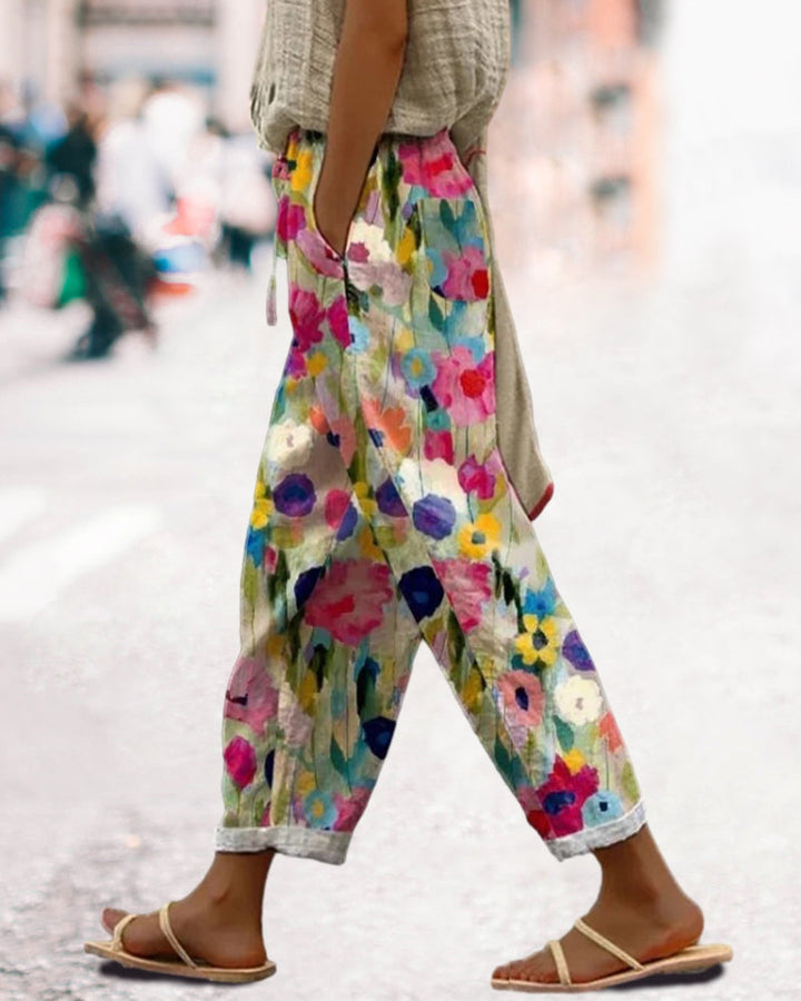 Women's relaxed fit floral print trousers. Perfect casual pants for summer, vacation, or boho style comfort.