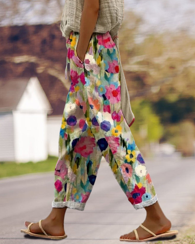 Stylish women's floral print casual trousers. Lightweight and comfortable for relaxed summer wear.