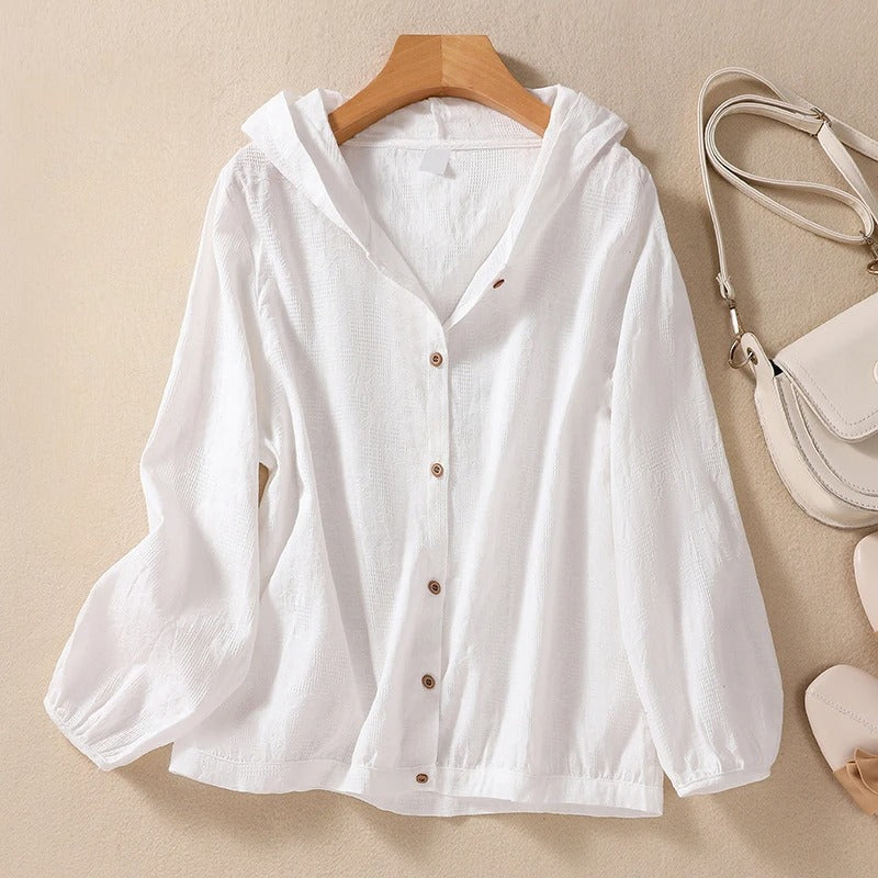 Women's relaxed fit hooded shirt for effortless everyday style. Comfortable casual layering top.