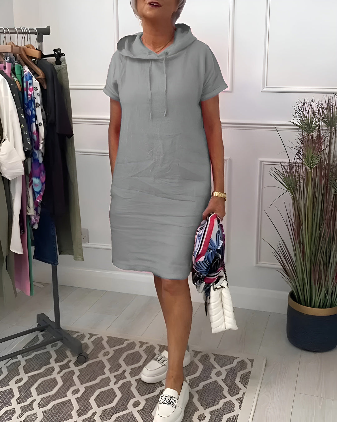 Women's relaxed fit midi dress, hoodie design, half sleeve, adjustable hood, ideal for casual wear.