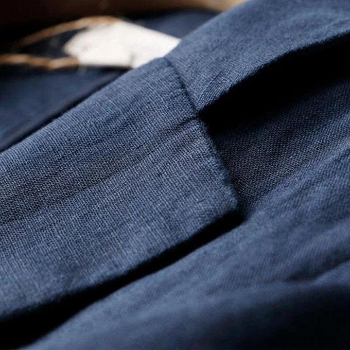 Modern women's relaxed fit blazer in a neutral tone, an essential chic layering piece for versatile fashion.