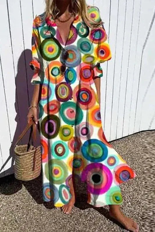 Woman wearing a comfortable, relaxed fit maxi dress. Flowy design for spring/summer casual or elegant occasions.