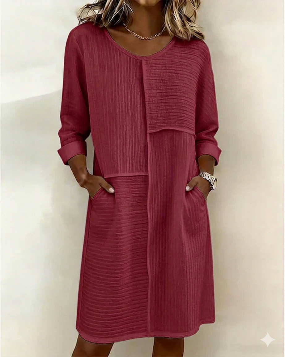 Effortlessly chic women's relaxed fit shift dress, an everyday essential with pockets for ultimate comfort.