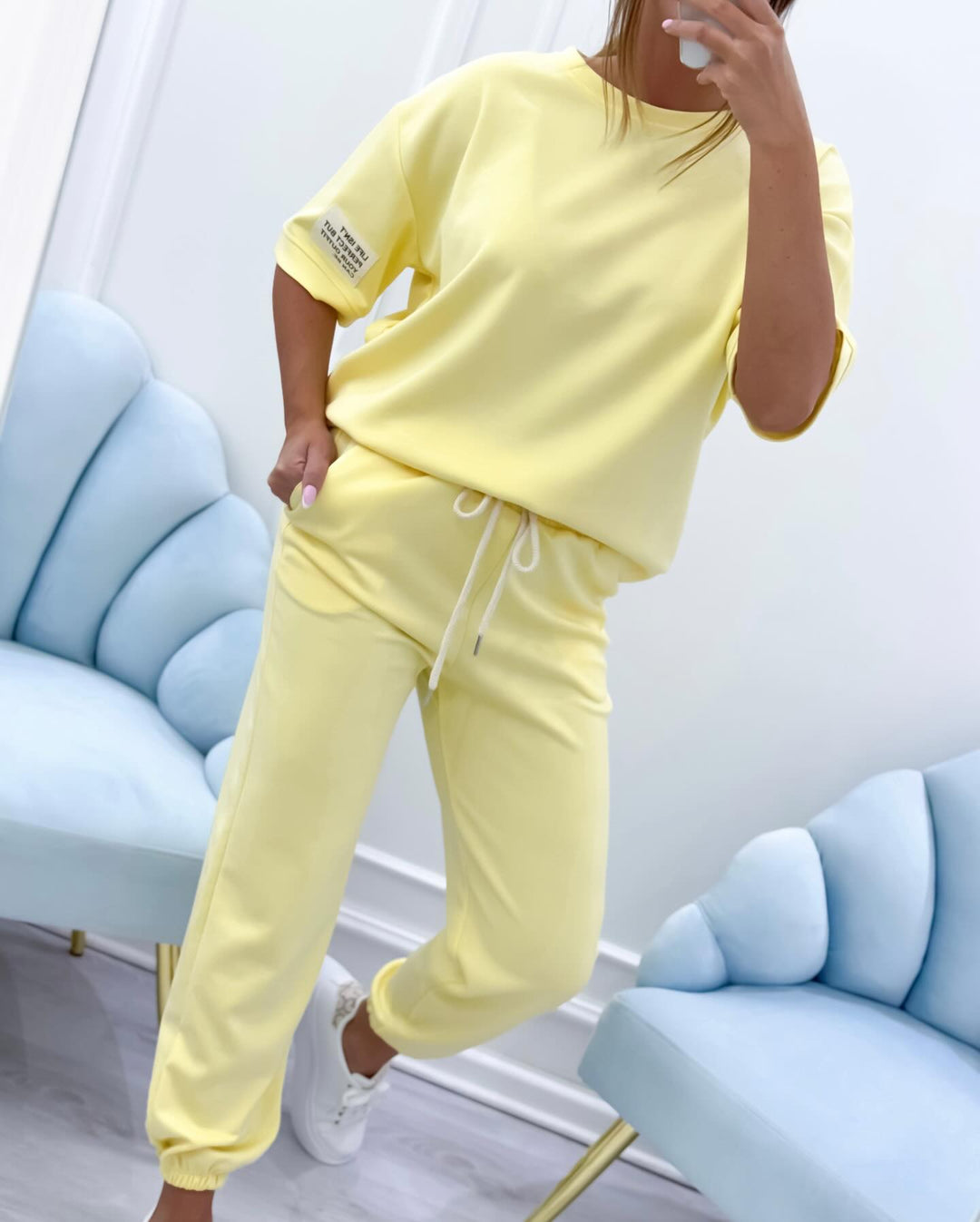 Women's relaxed fit short sleeve set, a comfortable two-piece outfit for casual and everyday wear.