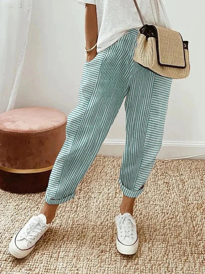Comfortable women's striped lounge trousers with relaxed fit and elastic waist for ultimate everyday comfort.