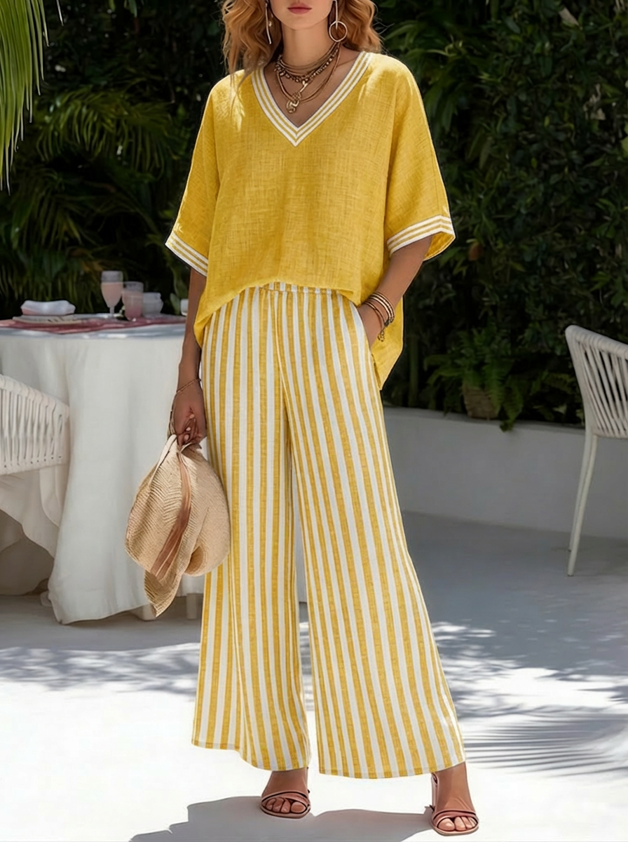 Chic women's striped shirt & wide leg pant set. Relaxed fit v-neck top for comfortable casual wear.