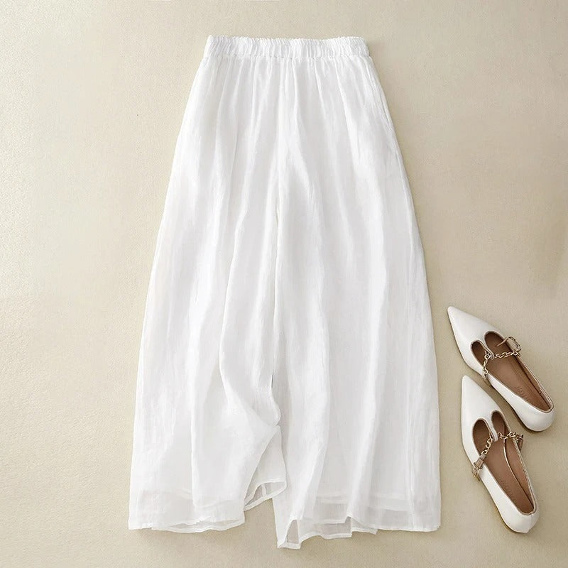 Stylish women's relaxed fit trousers with a comfortable loose waist, essential versatile bottoms for spring fashion.