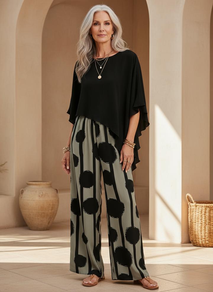 Women's relaxed fit two-piece summer set with abstract print, ideal for casual, comfortable wear.