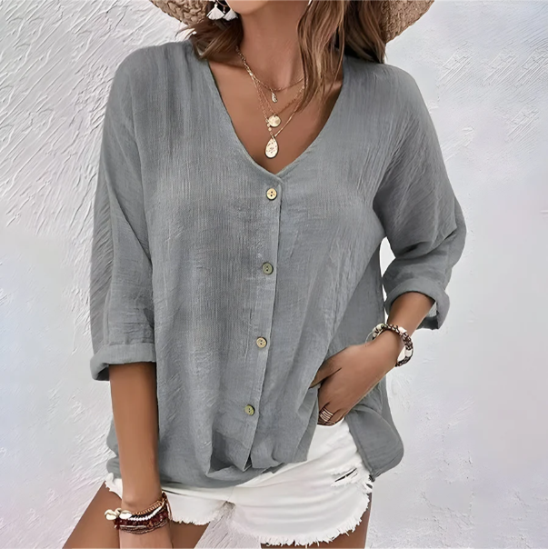 Comfortable women's V-neck roll sleeve button-up blouse, ideal for everyday casual wear & versatile styling.