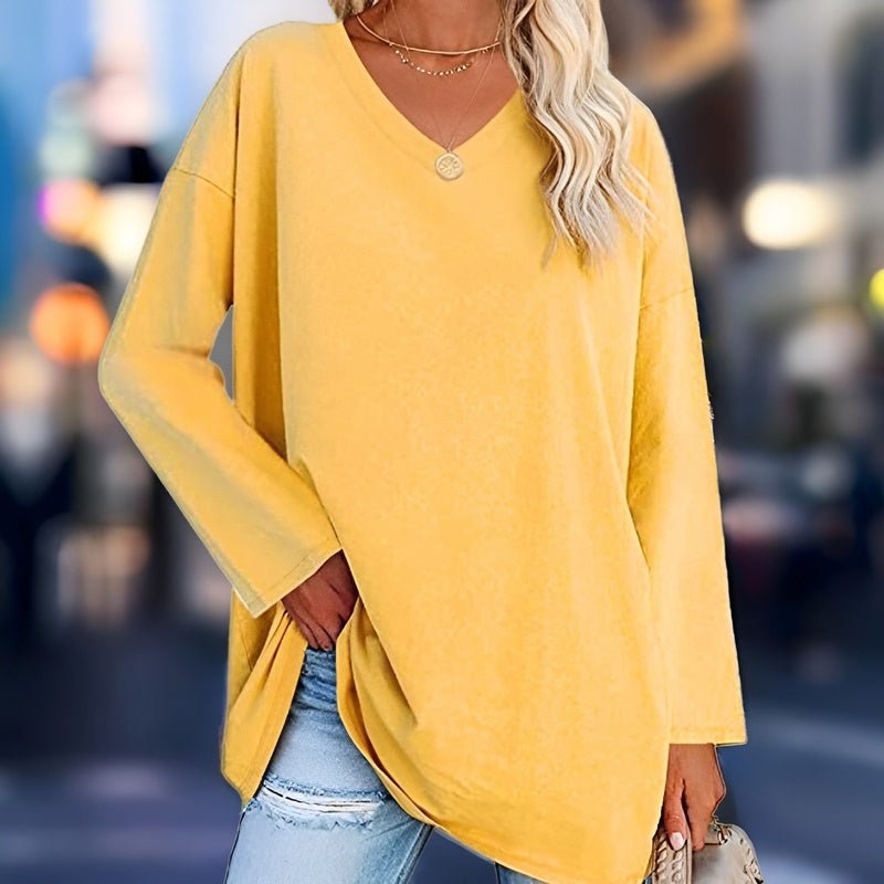 Women's relaxed fit V-neck shirt. Long sleeve casual top for everyday comfort and chic style.