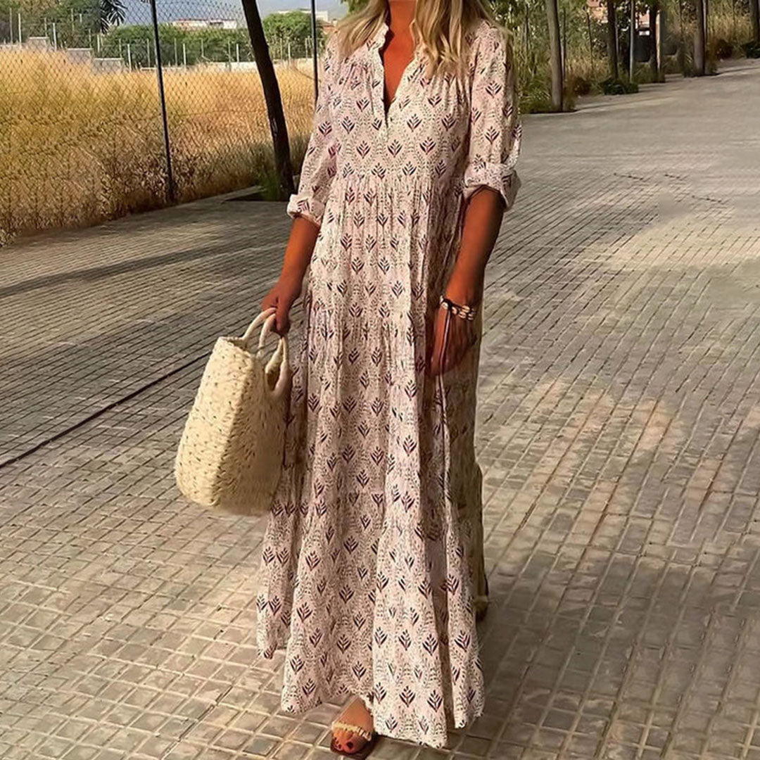 Comfortable women's relaxed fit V-neck maxi dress with a chic boho print, versatile for summer and everyday wear.
