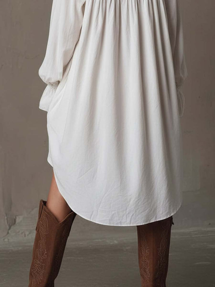Elegant women's white retro mini dress, featuring long sleeves & a chic irregular hem. Ideal for parties or unique casual style.