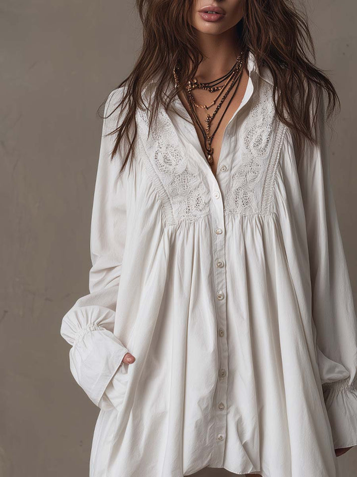 Versatile women's white retro mini dress. Long sleeves & irregular hem offer a unique, elegant look for any occasion.