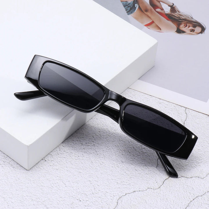 Chic women's retro slim shades, perfect 90s fashion eyewear providing essential UV protection for summer.