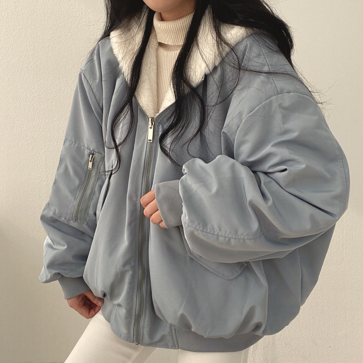 Women's reversible hooded jacket, showing both stylish sides for versatile casual fall/winter wear.