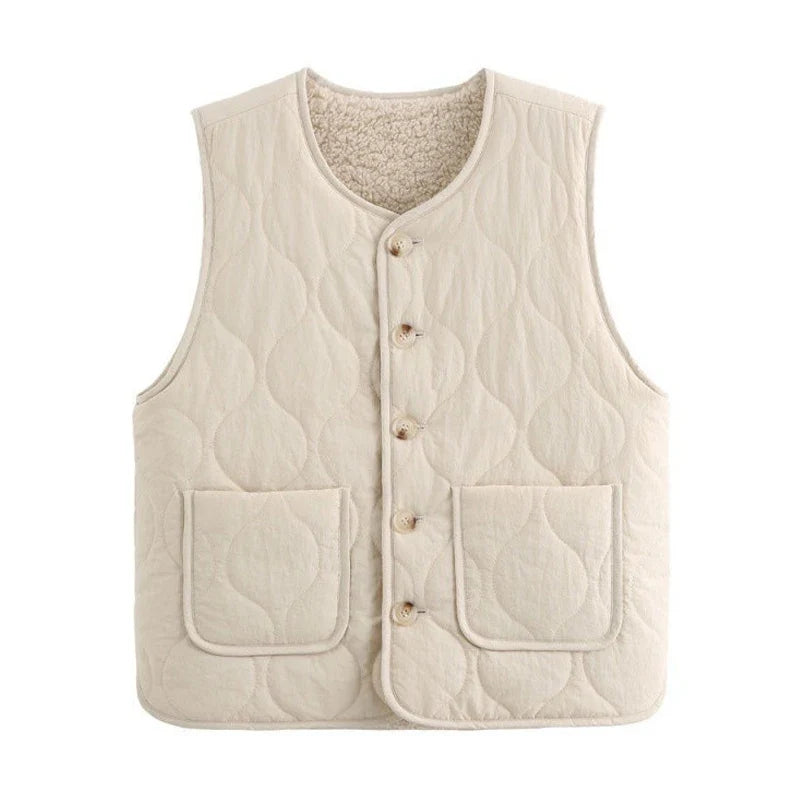 Versatile women's reversible quilted vest in khaki, an essential button-up fall fashion layer.