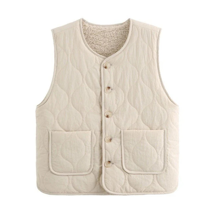 Versatile women's reversible quilted vest in khaki, an essential button-up fall fashion layer.